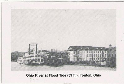     The picture to the right is taken from a postcard donated to the library. It features an Ironton house and wharf boat.